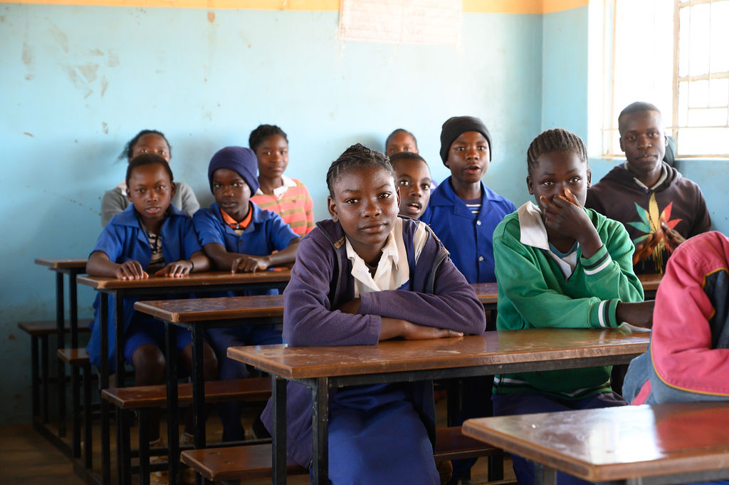 Students sitting attentively in a classroom